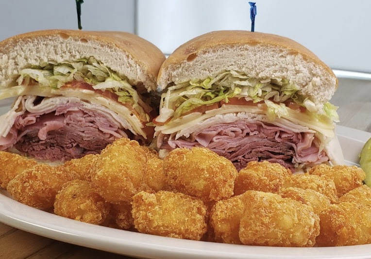 Dagwood’s Deli & Sports Bar signature dishes Philly Cheesesteak
Turkey Club Sandwich
Chicken Fritters